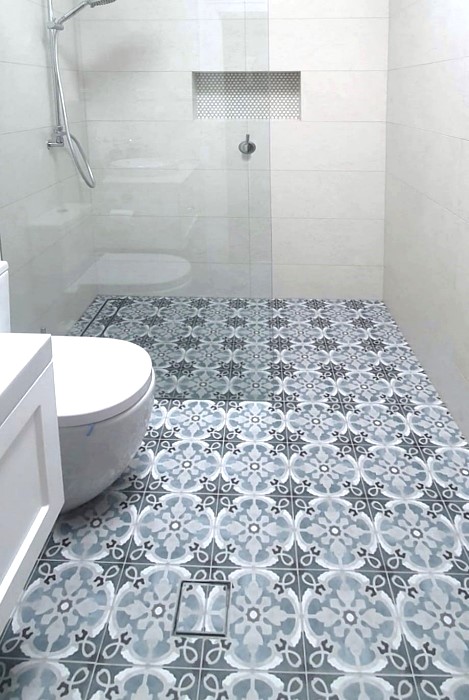 new bathroom with blue pattern floor tiles in Sydney