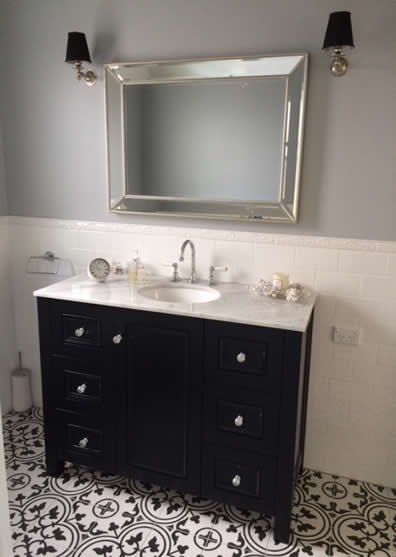Patterned bathroom floor tiles