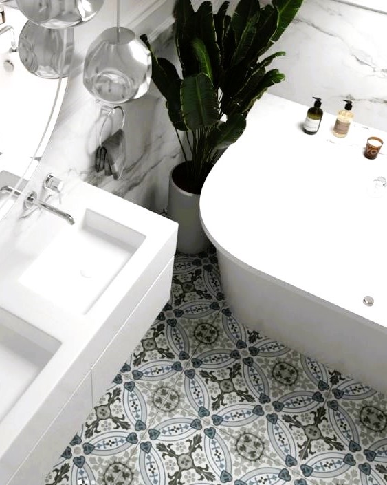 Blue encaustic look pattern tiles on a bathroom floor