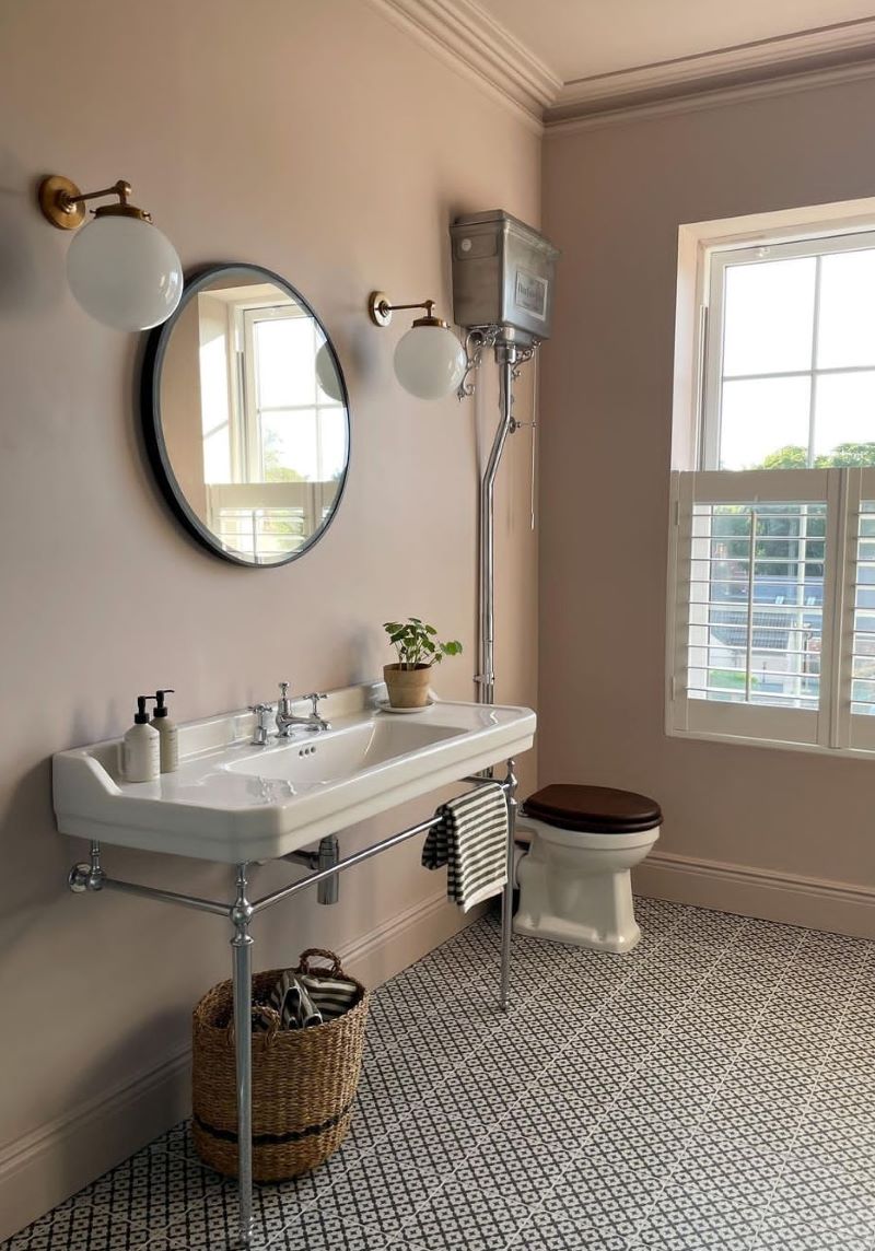 Classic Bathroom tiled with monochrome black and white pattern tiles