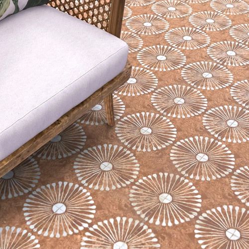 Terracotta patterned floor tiles laid