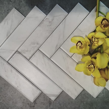 Carrara marble look subway tiles