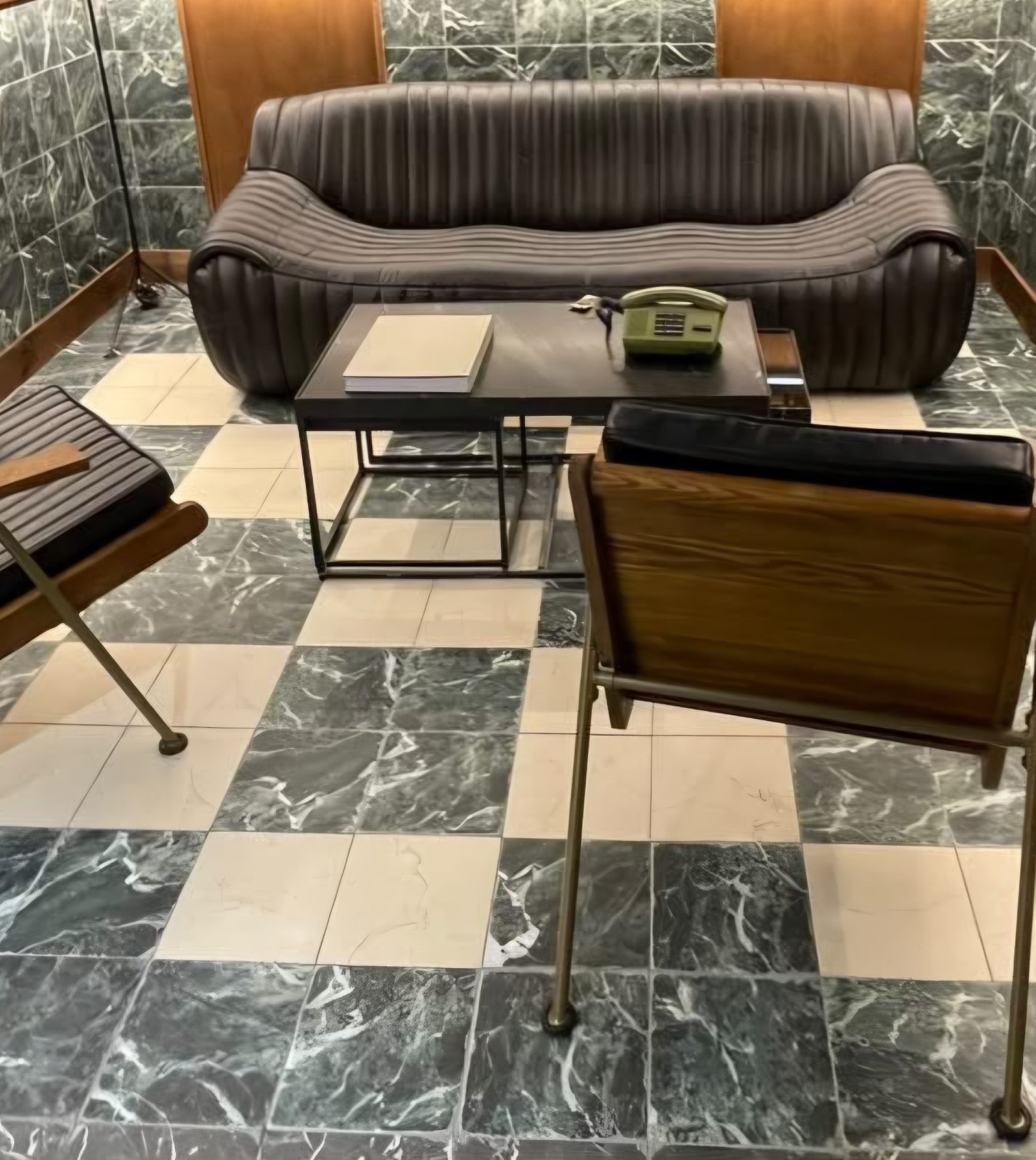 Marble look tile in a checkerboard floor layout