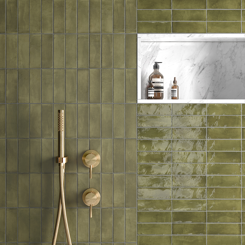 Coco wall tiles in grey matt and gloss finishes laid in a bathroom