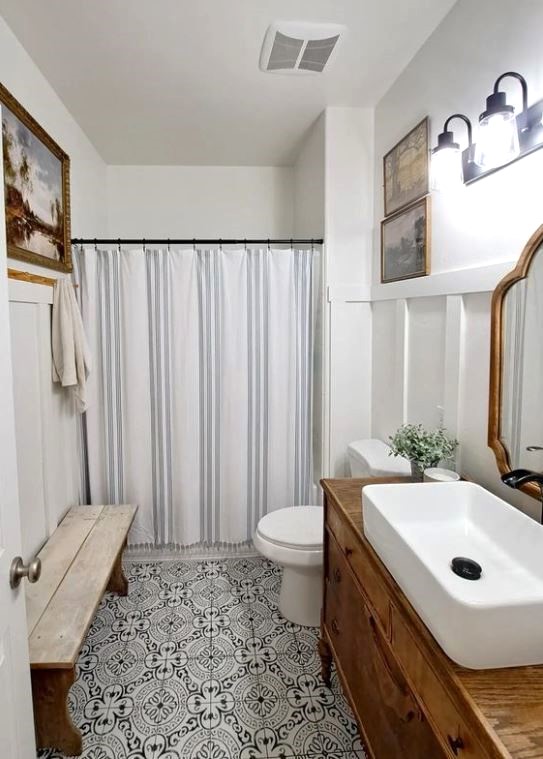 Farmhouse bathroom with black and white pattern floor tiles