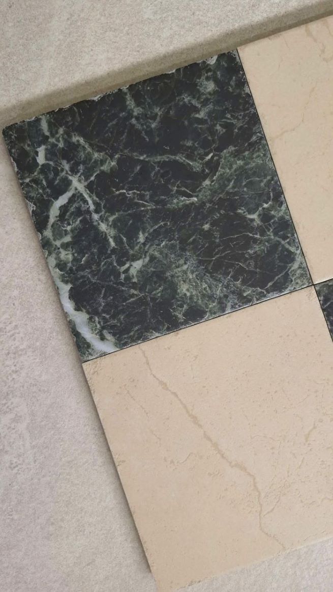 Emerald Green marble look porcelain tile in a checkerboard pattern