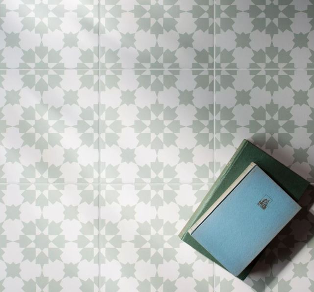 Sage green and white Moroccan pattern floor tiles laid showing full effect