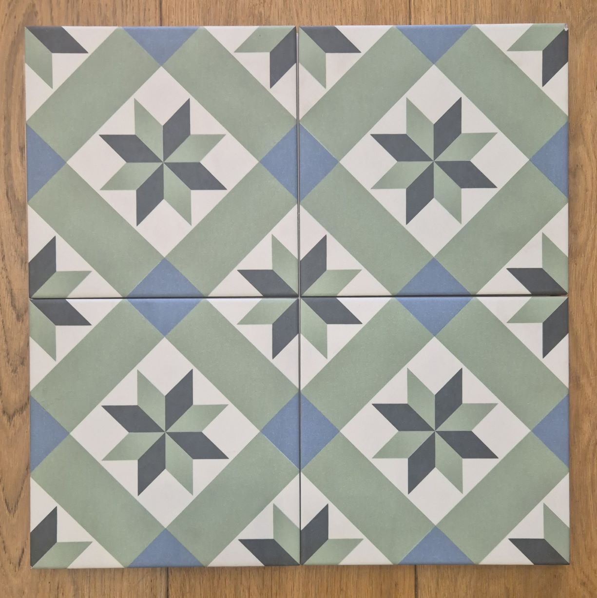 Heritage encaustic-look pattern tiles in green, blue and charcoal