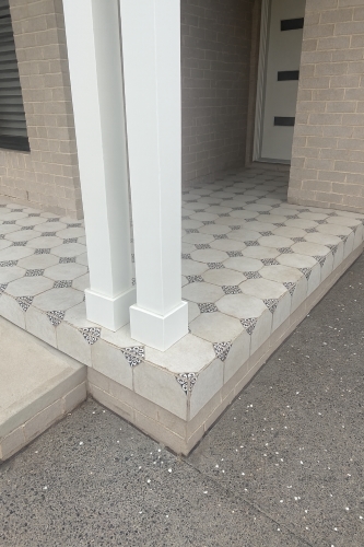 Sydney outdoor renovation with vintage black and white floor tiles