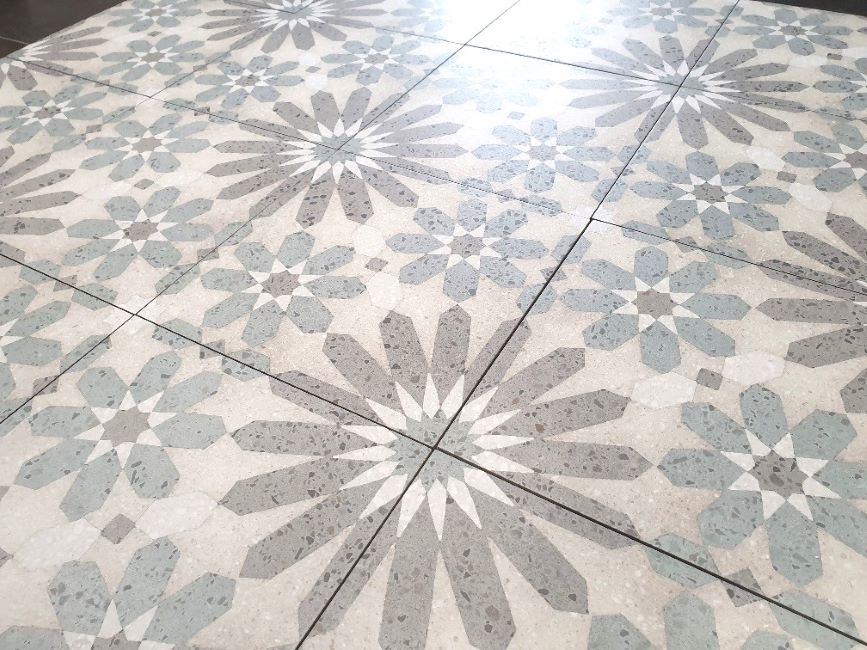 Patterned porcelain floor tiles