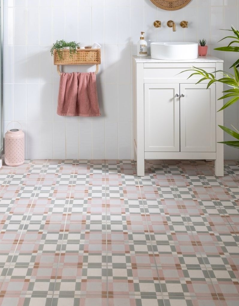 Bathroom renovation with pink geometric retro tiles