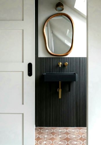 Terracotta feature tiles in Bathroom